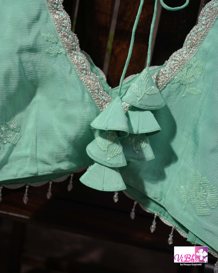 Mint Green Designer Saree with Tonal Floral Embroidery and Tassel Details
