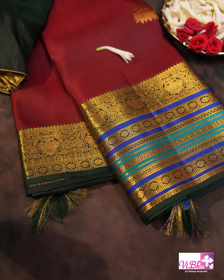 Dark Maroon And Green Kanchi Silk Saree And Blouse