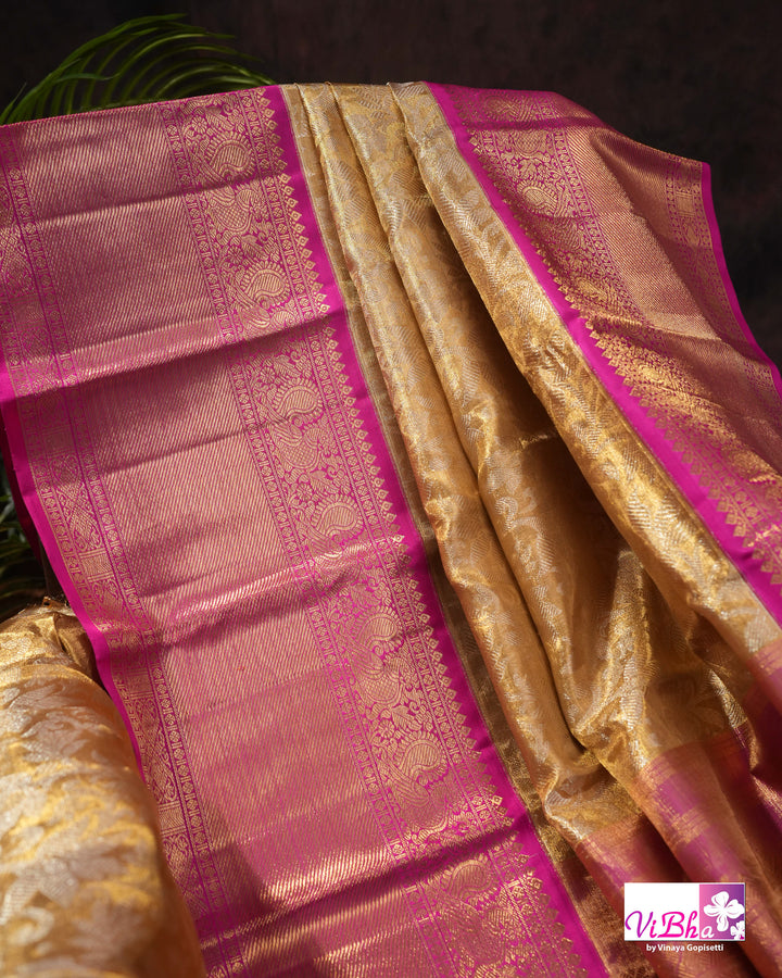 Gold Kanchi Silk Saree with Magenta Pink Border and Ornate Woven Pallu