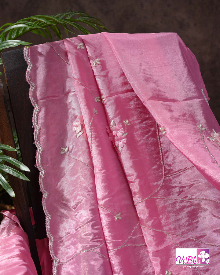 Pink Shimmer Designer Saree with Floral Detailing and Fuchsia Blouse Styling