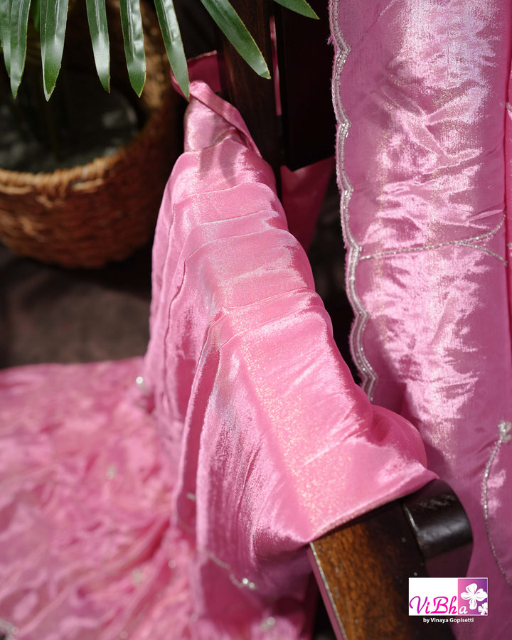 Pink Shimmer Designer Saree with Floral Detailing and Fuchsia Blouse Styling