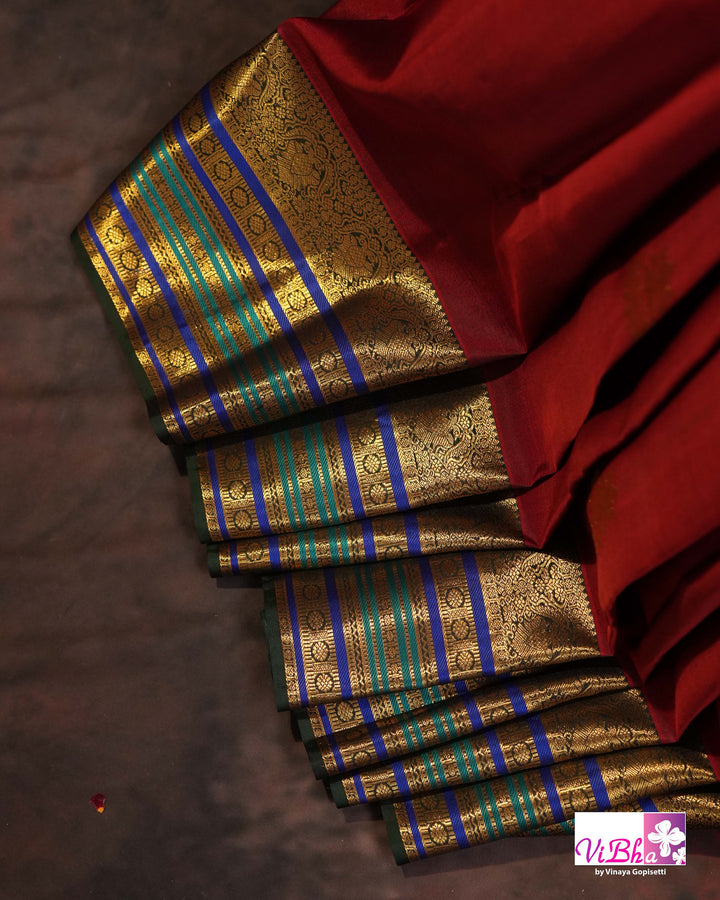 Dark Maroon And Green Kanchi Silk Saree And Blouse