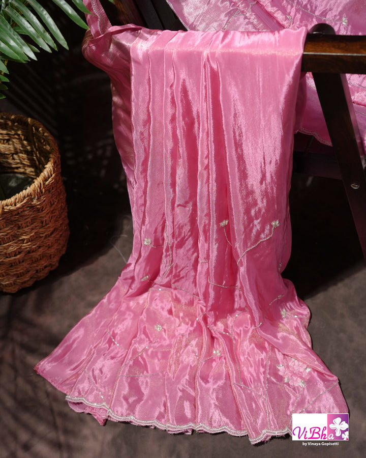 Pink Shimmer Designer Saree with Floral Detailing and Fuchsia Blouse Styling