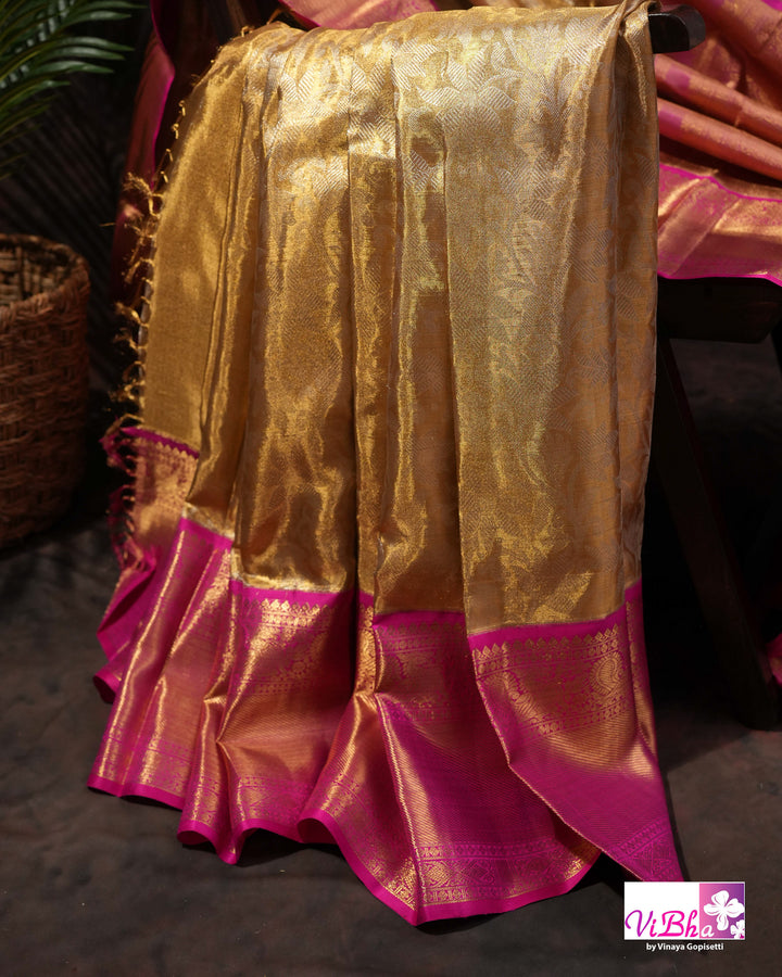 Gold Kanchi Silk Saree with Magenta Pink Border and Ornate Woven Pallu