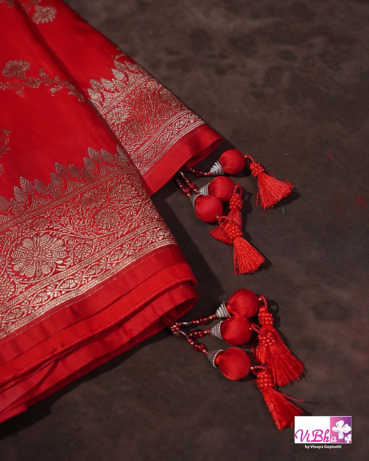 Red all over silver zari saree
