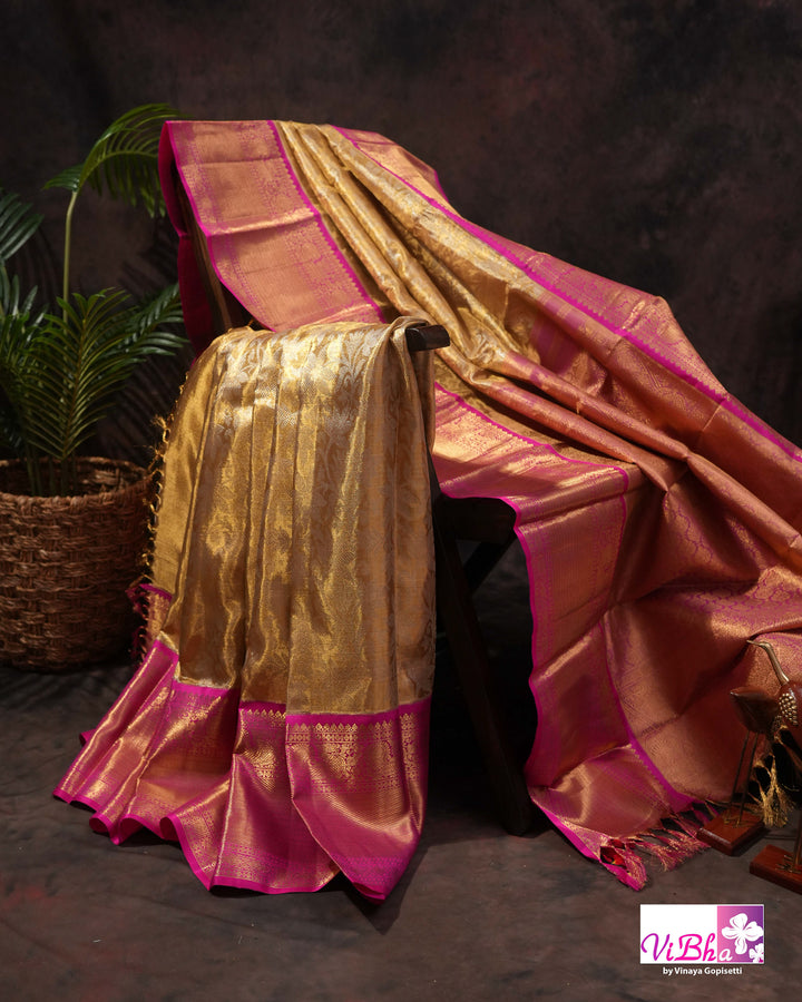 Gold Kanchi Silk Saree with Magenta Pink Border and Ornate Woven Pallu