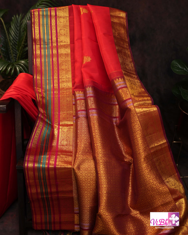 Red Kanchi Silk Saree With Deep Maroon Blouse