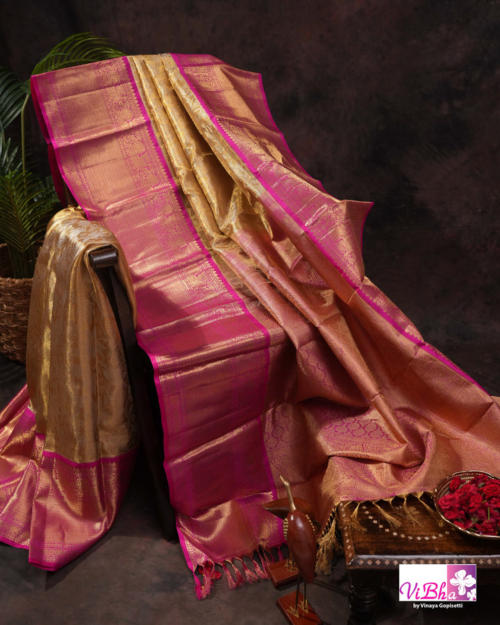 Gold Kanchi Silk Saree with Magenta Pink Border and Ornate Woven Pallu