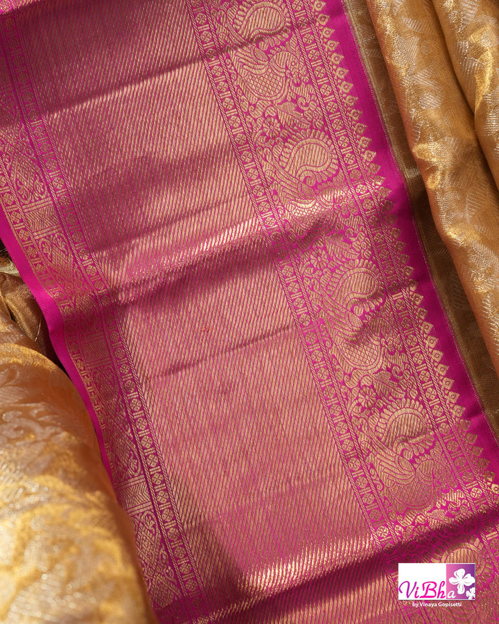 Gold Kanchi Silk Saree with Magenta Pink Border and Ornate Woven Pallu
