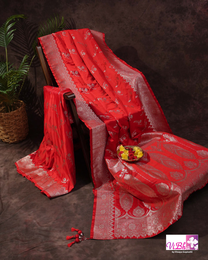 Red all over silver zari saree