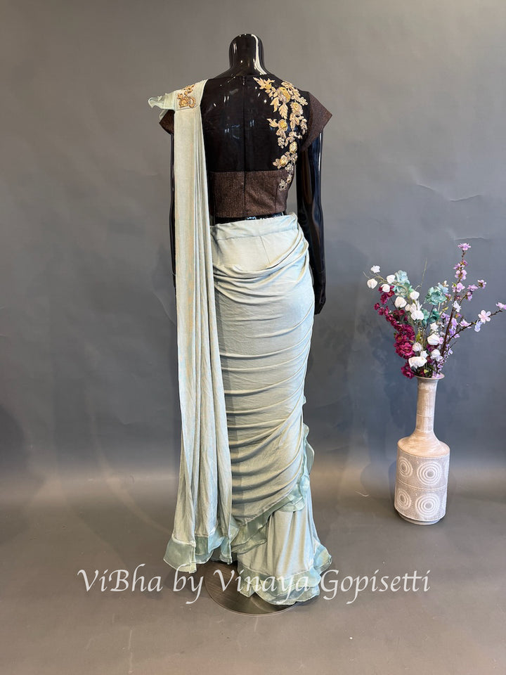 Dusty Ice blue and brown pre draped saree and blouse
