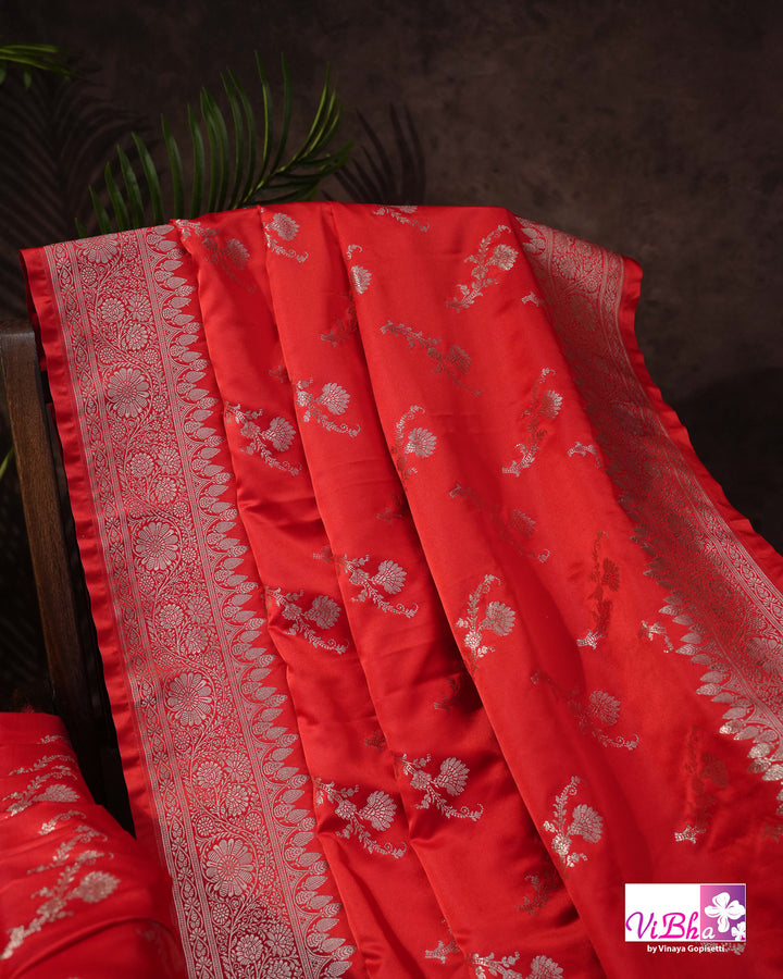 Red all over silver zari saree