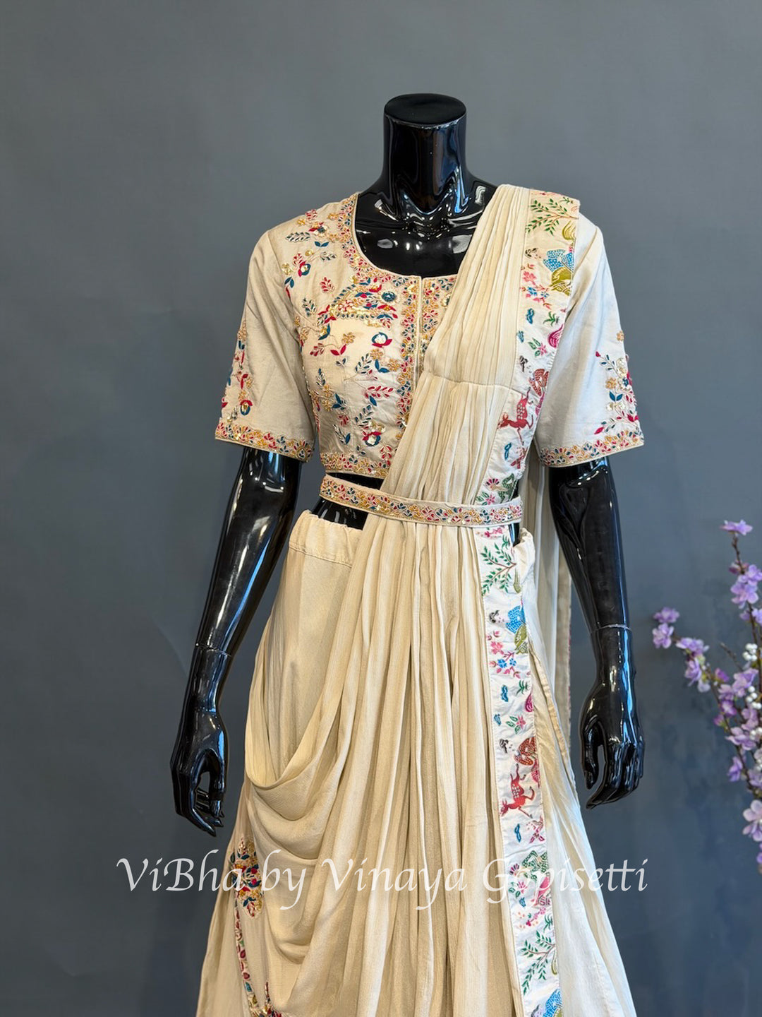 Cream and Multi Color Skirt Embroidered Draped Saree