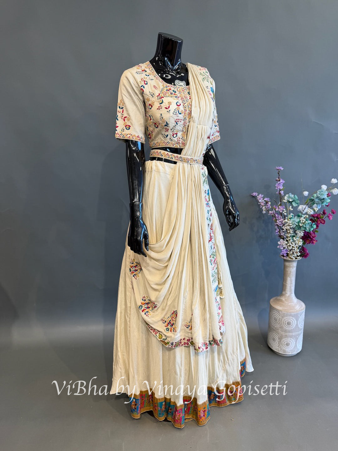 Cream and Multi Color Skirt Embroidered Draped Saree