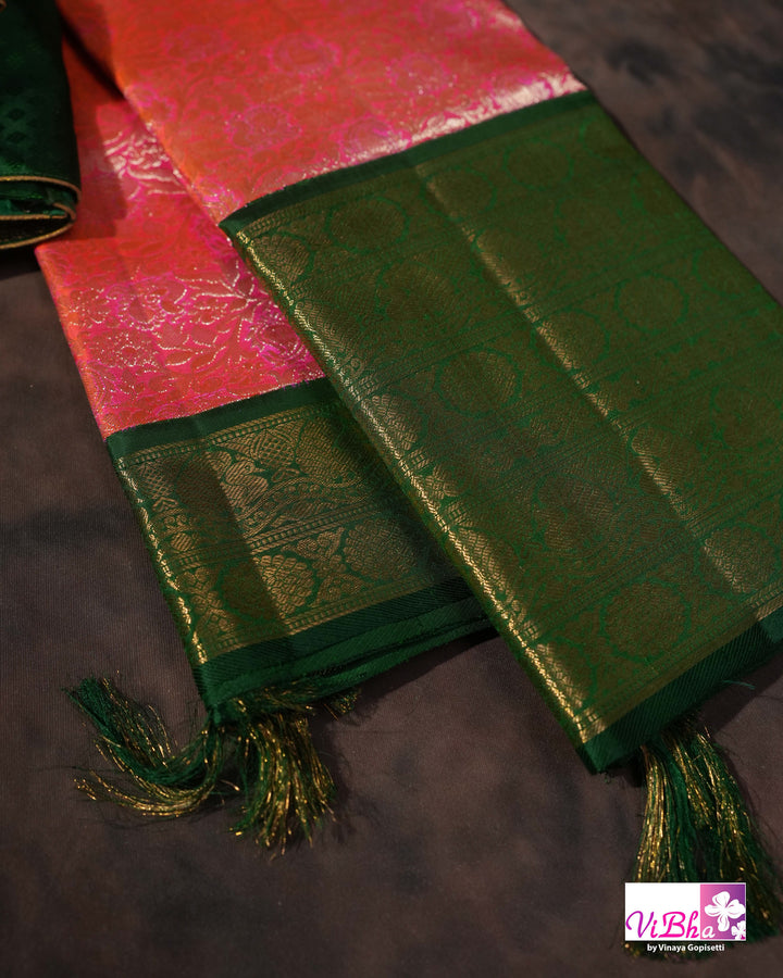 Coral Pink Kanchi Silk Saree with Floral Woven Design and Forest Green Gold Border