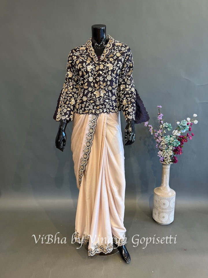 Blush pink and dark purple jacket pre draped saree