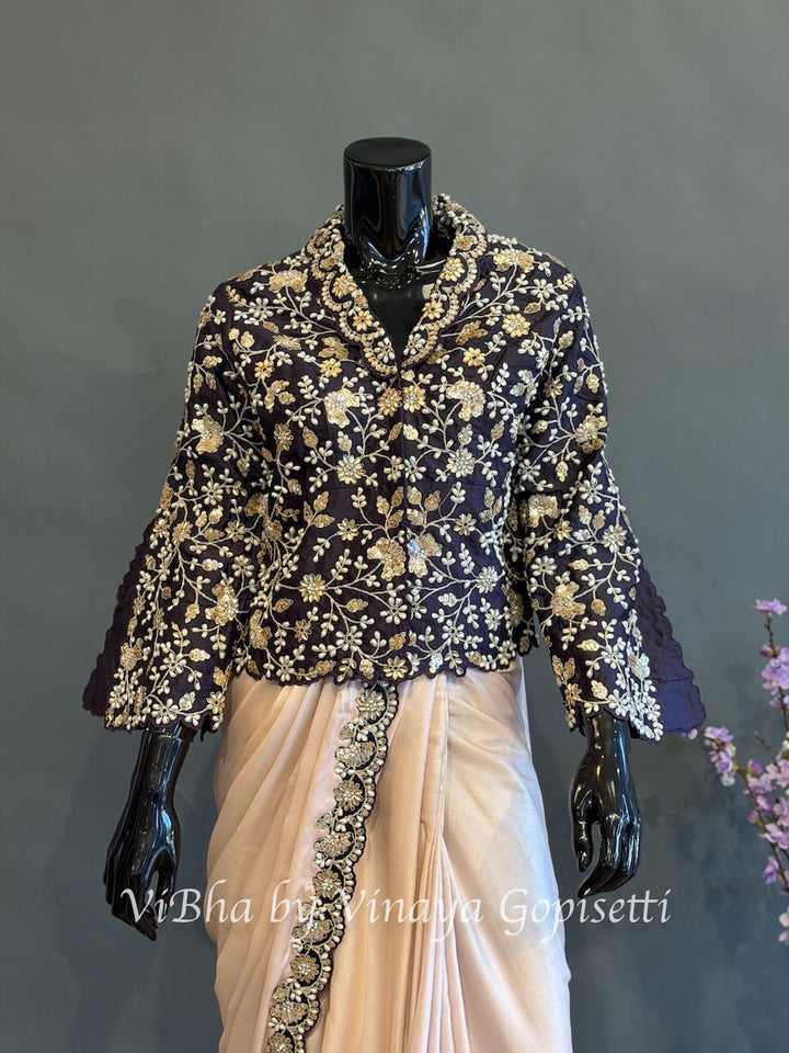 Blush pink and dark purple jacket pre draped saree