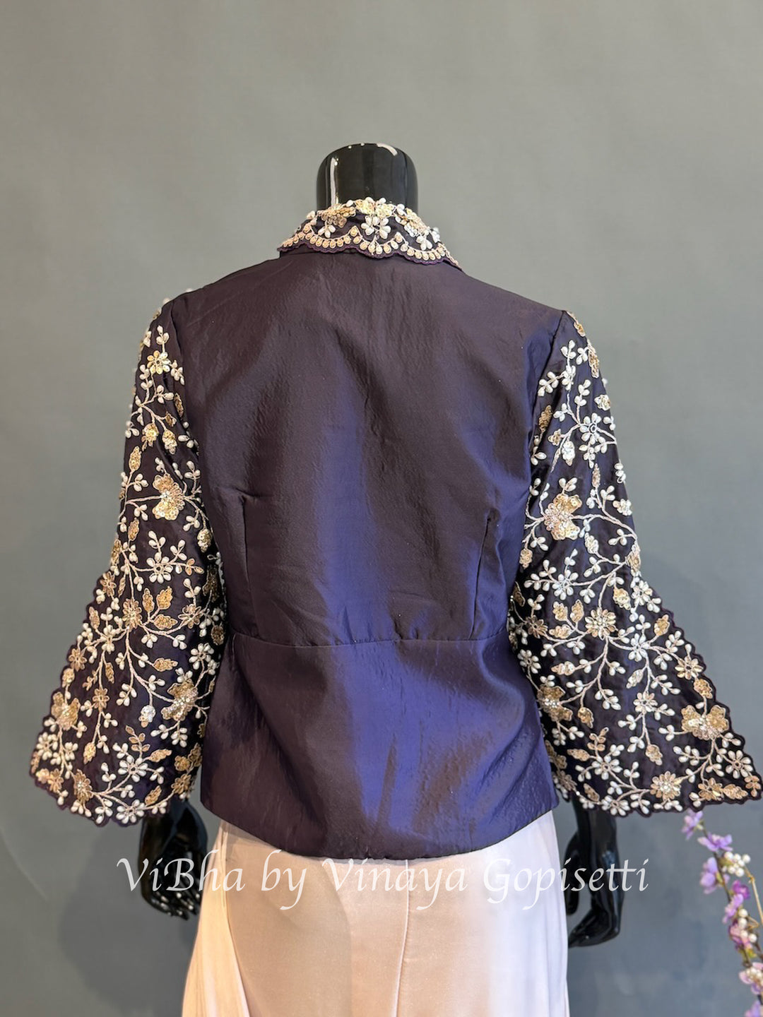 Blush pink and dark purple jacket pre draped saree