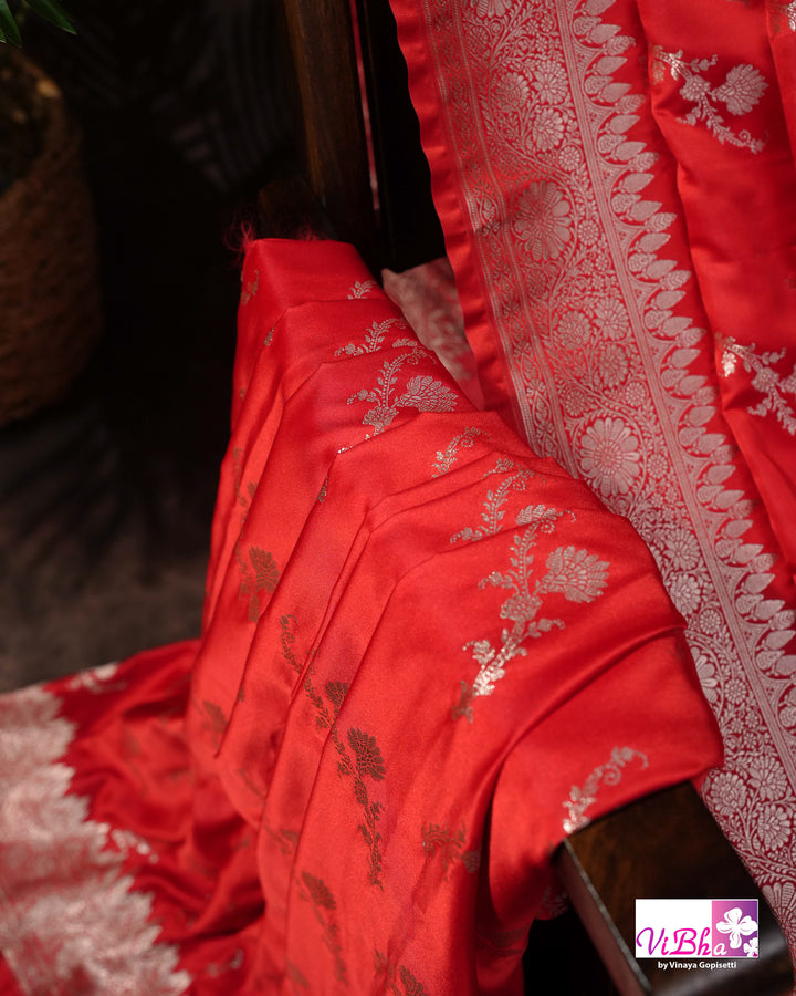Red all over silver zari saree
