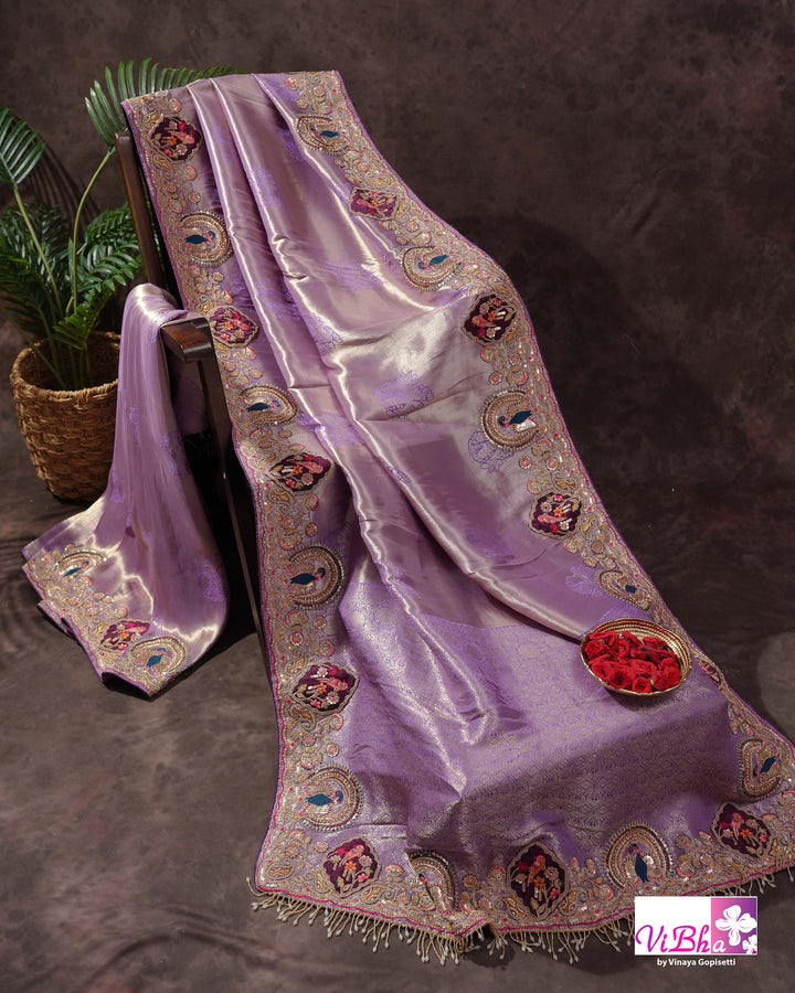 Lavender Designer Saree with Ornate Peacock and Figurative Embellishments