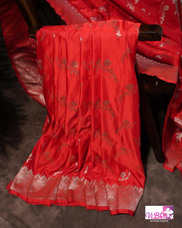Red all over silver zari saree