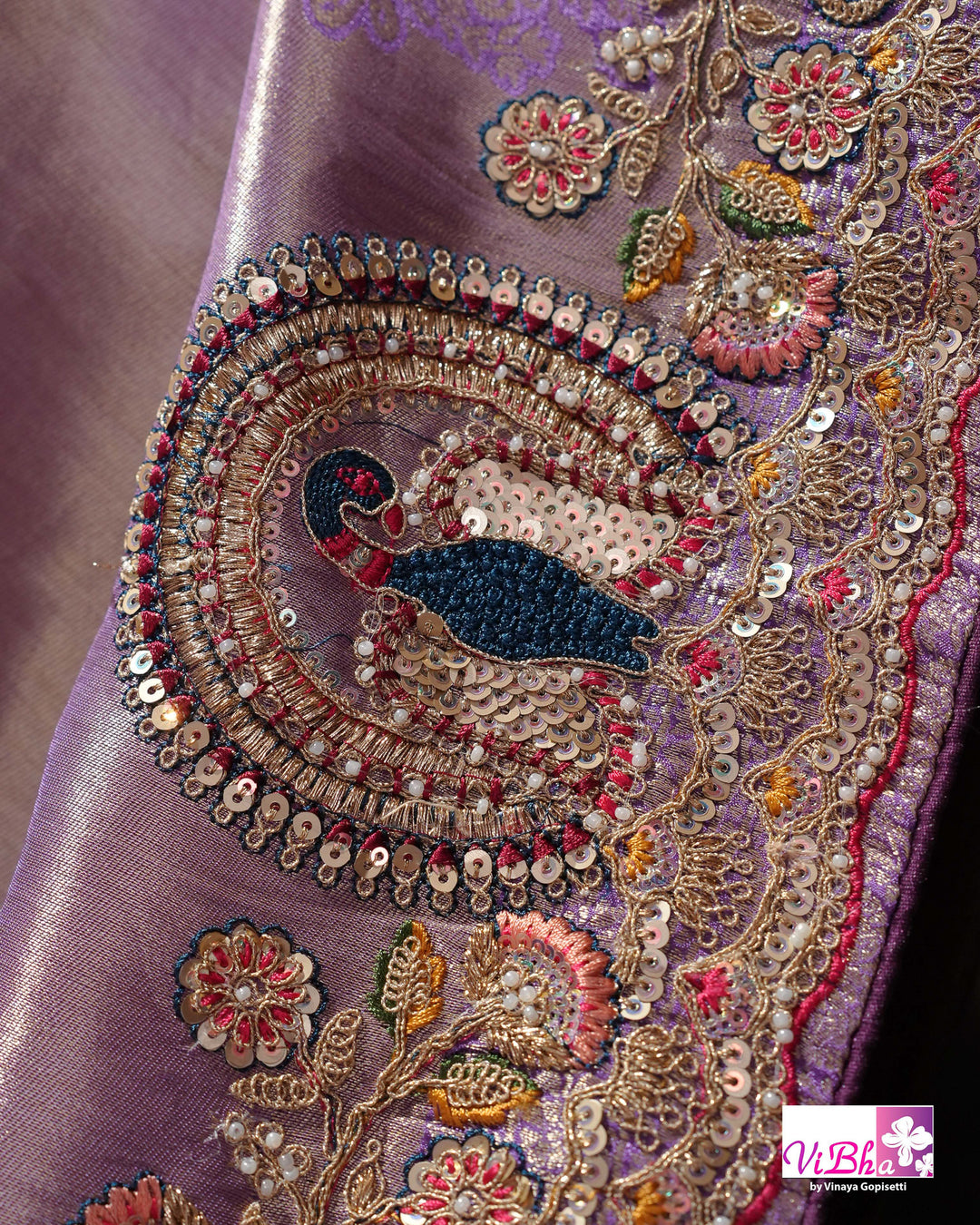 Lavender Designer Saree with Ornate Peacock and Figurative Embellishments