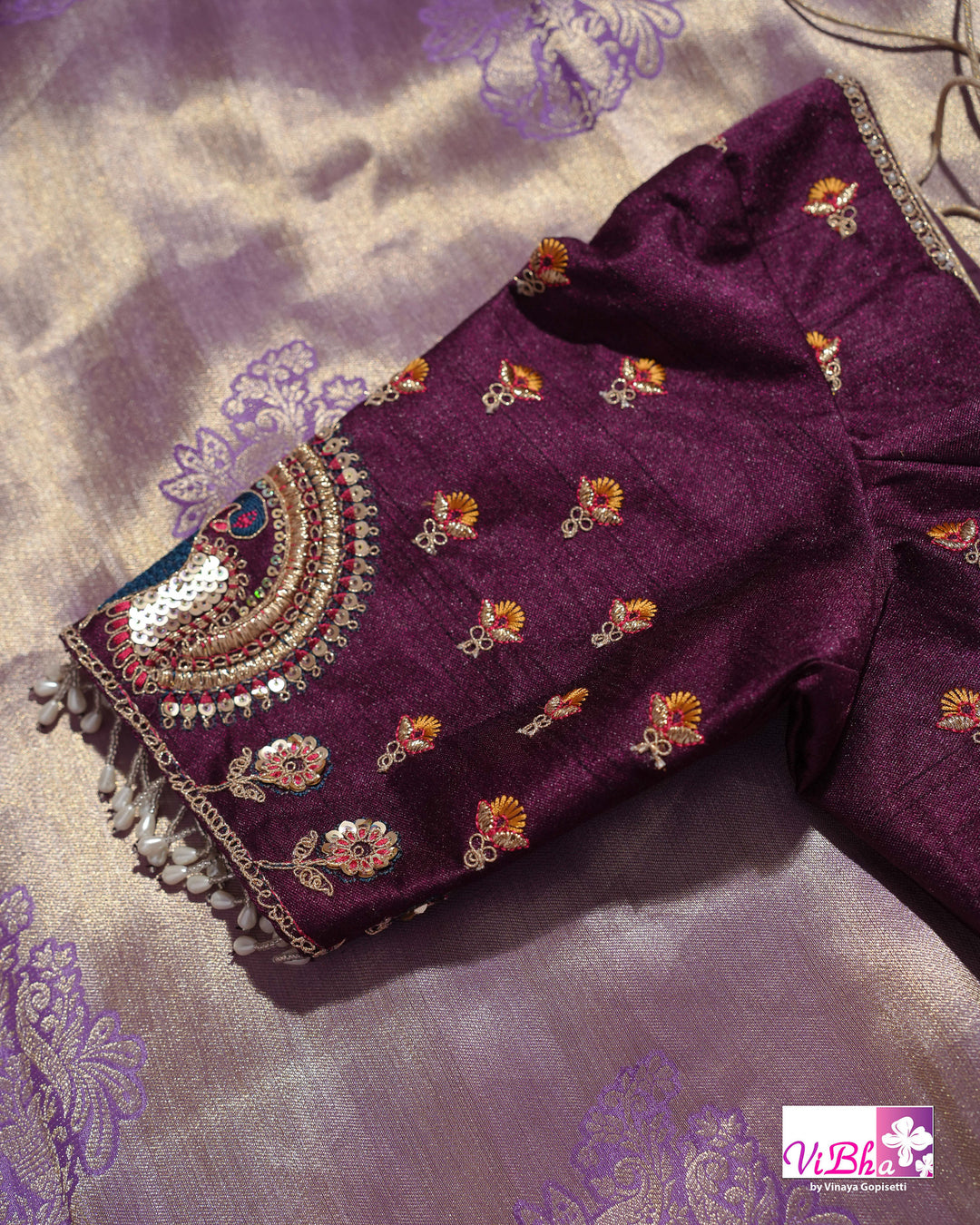 Lavender Designer Saree with Ornate Peacock and Figurative Embellishments