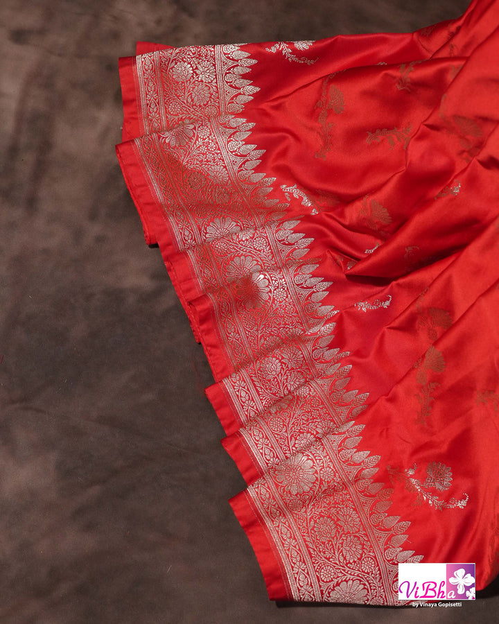 Red all over silver zari saree