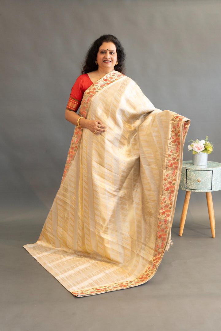 Silver And Gold Kanchi SIlk Saree And Blouse With Petit Point Embroidered Borders