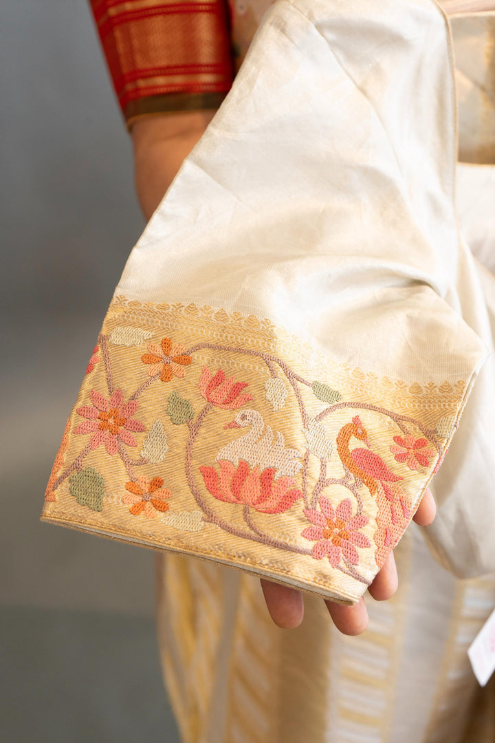 Silver And Gold Kanchi SIlk Saree And Blouse With Petit Point Embroidered Borders