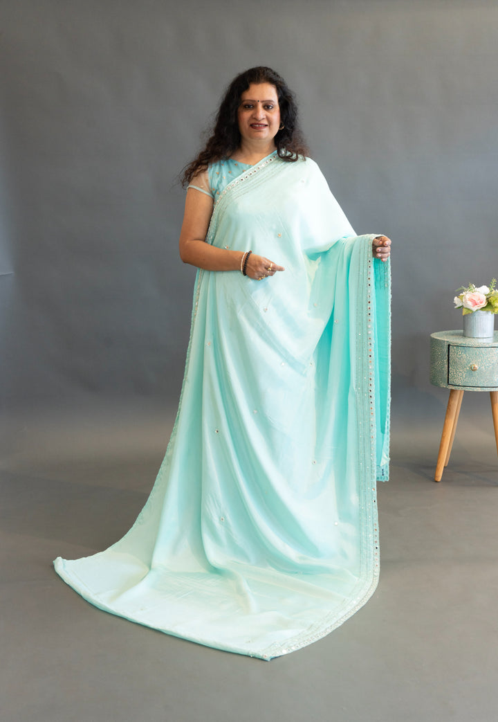 Sky-Blue Plain Saree And Blouse With Mirror-Work Borders Saree