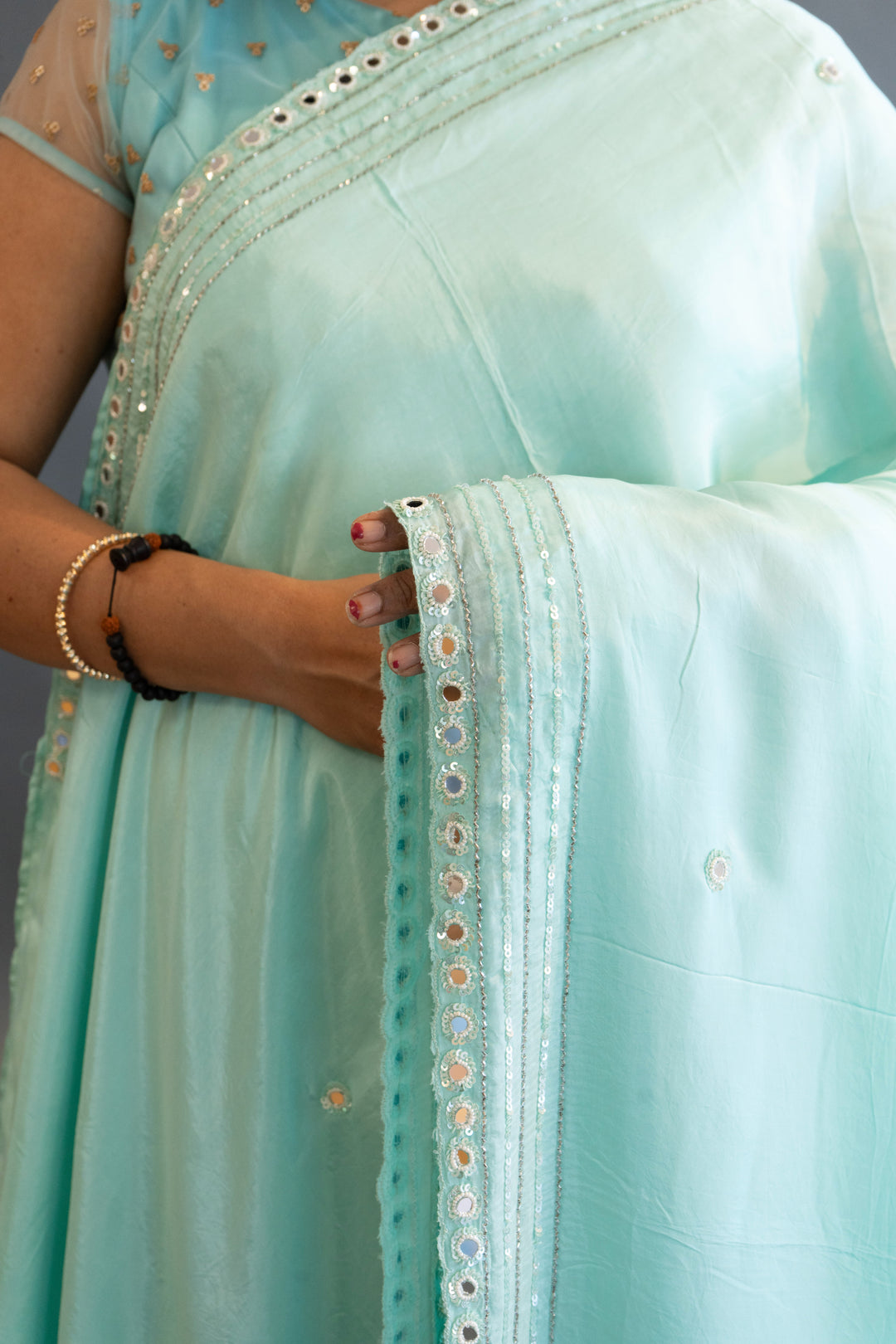 Sky-Blue Plain Saree And Blouse With Mirror-Work Borders Saree