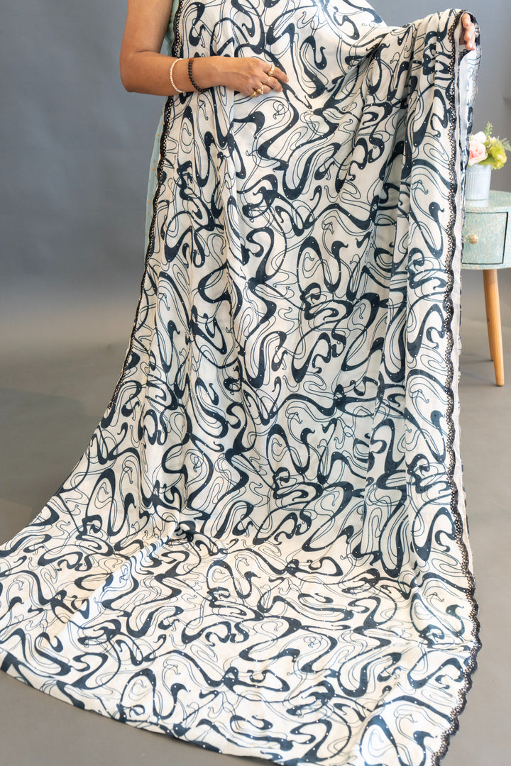 White And Blue Abstract Print Saree And Blouse With Embroidered Borders