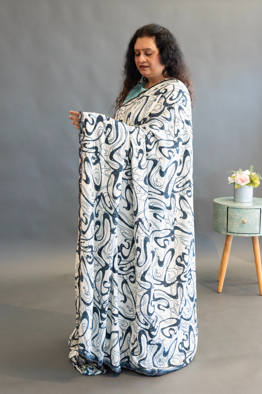 White And Blue Abstract Print Saree And Blouse With Embroidered Borders