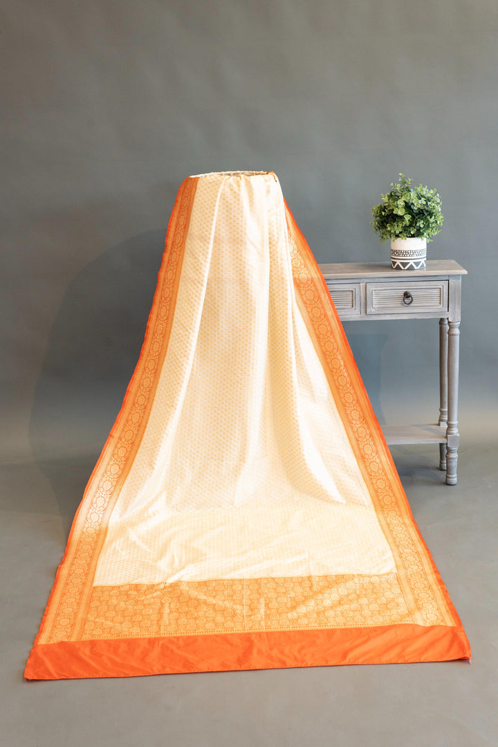 Off-white And Orange Banarasi Silk Saree And Blouse