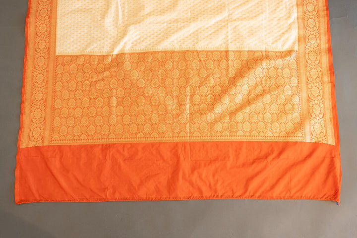 Off-white And Orange Banarasi Silk Saree And Blouse