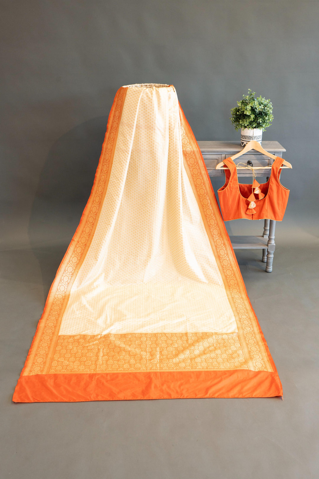 Off-white And Orange Banarasi Silk Saree And Blouse