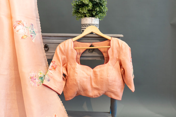 Pastel-Peach Soft Organza Saree And Blouse With Pichwai Work