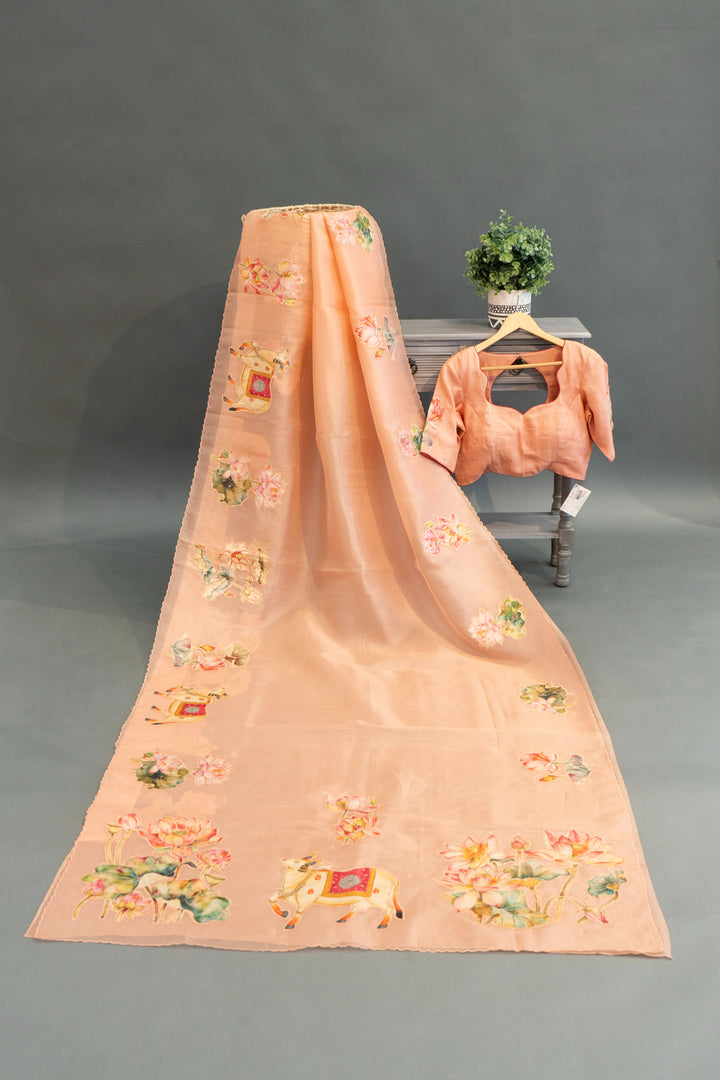 Pastel-Peach Soft Organza Saree And Blouse With Pichwai Work