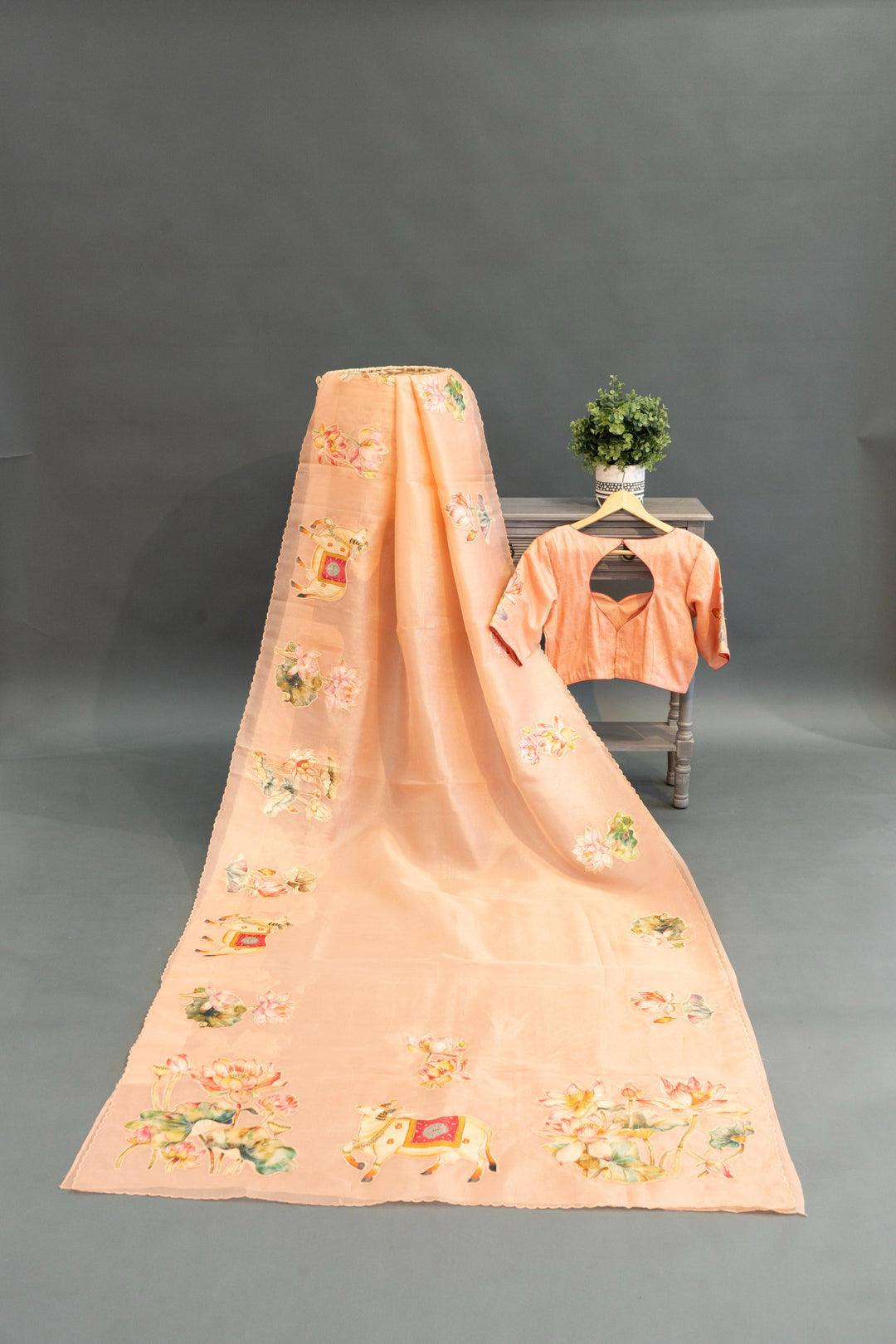 Pastel-Peach Soft Organza Saree And Blouse With Pichwai Work