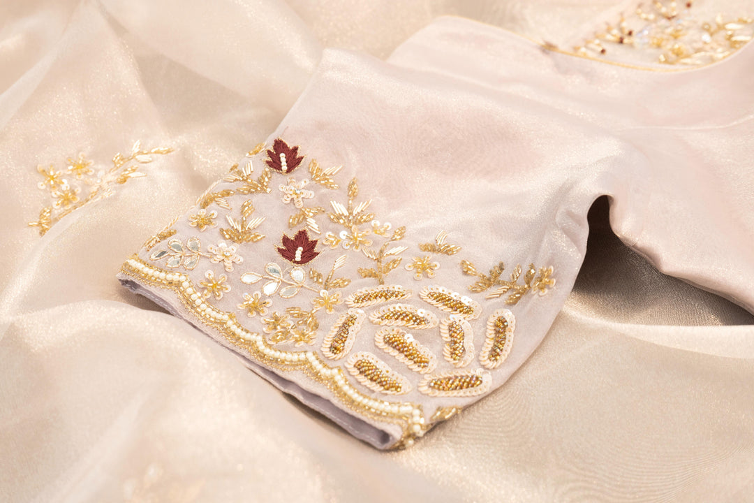Pastel Mauve Soft Organza Saree And Blouse With Hand-Embroidery
