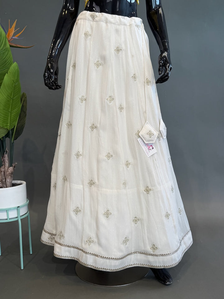 White Lehenga with Gold Blouse
