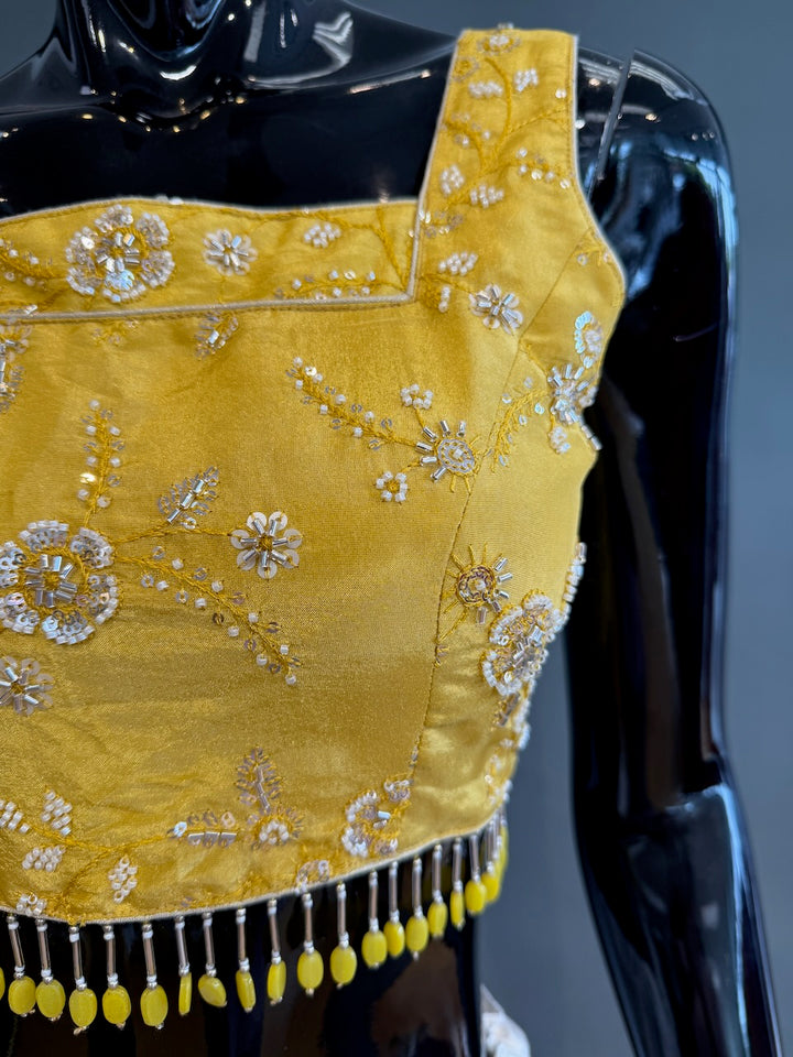 White Lehenga with Gold Blouse