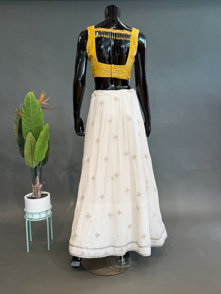 White Lehenga with Gold Blouse
