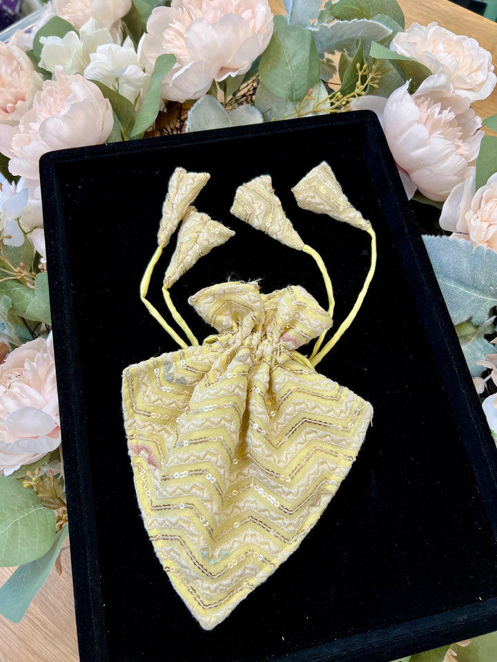 Sequins Work Pastel Yellow Potli Bag