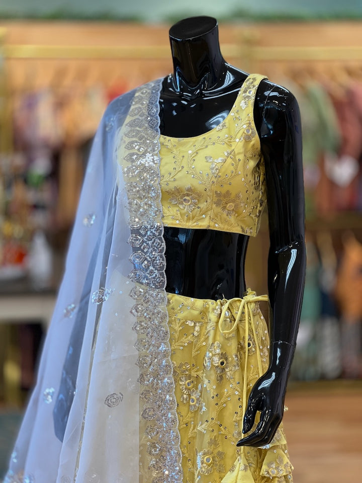 Pastel Yellow And White Embroidered Lehenga Set