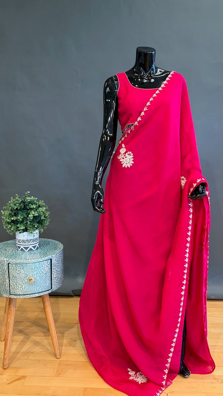 Rani Pink Embroidered Saree And Blouse