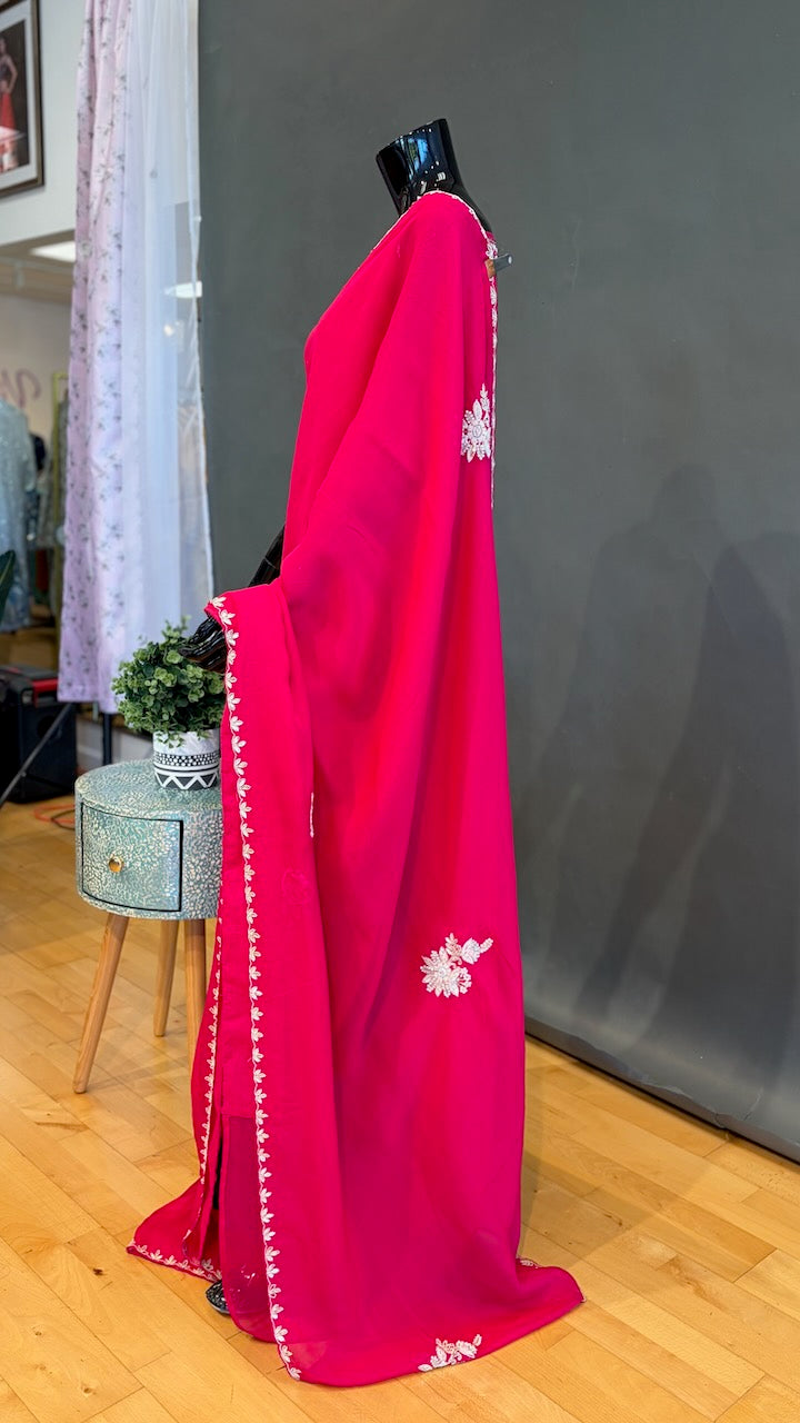 Rani Pink Embroidered Saree And Blouse