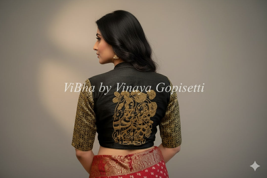 Black hand painted blouse with embroidery and Benares brocade sleeves.