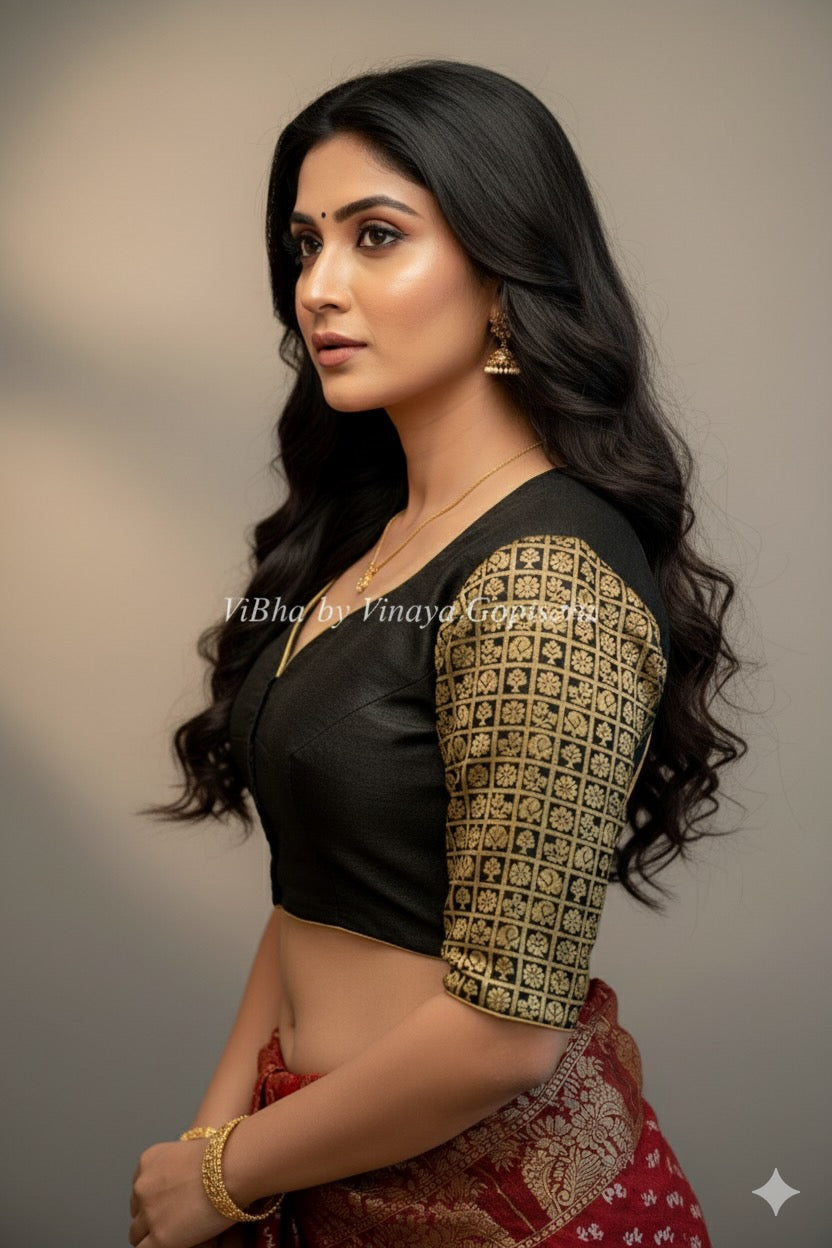 Black hand painted blouse with embroidery and Benares brocade sleeves.